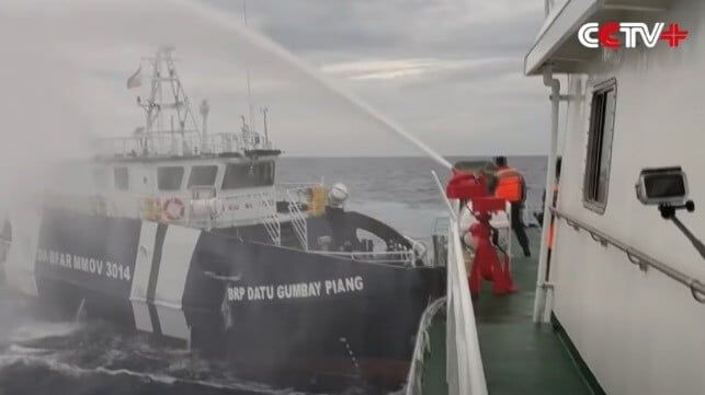 China - Philippines Vessels Collide as Water Cannons Used on Supply Mission